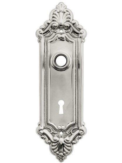 Stamped Brass French-Baroque Back Plate with Keyhole in Polished Nickel.